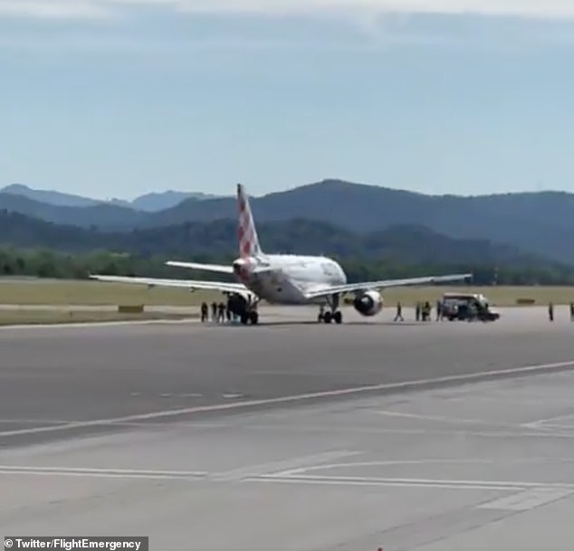 The man is believed to have forced one of the doors open in the baggage claim area before running on to the tarmac and into the path of an aircraft that was taxiing