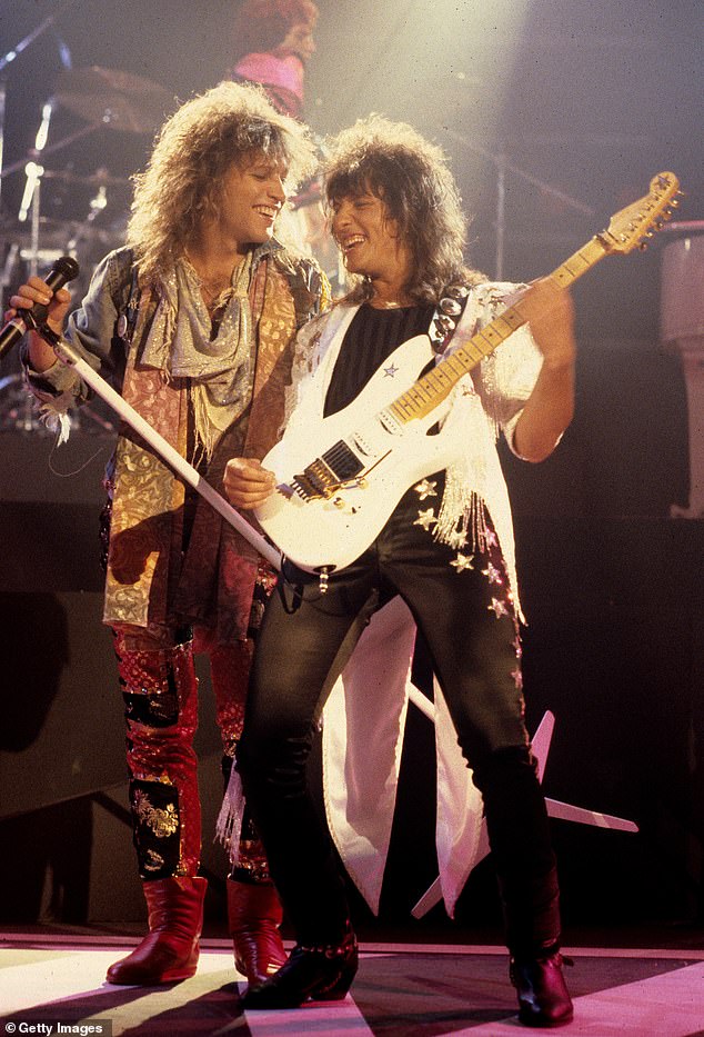 Sambora (right) shot to fame in 1983 as the lead guitarist in mega-band Bon Jovi and co-wrote monster hits Livin on a Prayer and You Give Love A Bad Name with Bon Jovi (left); they are pictured in July 1986