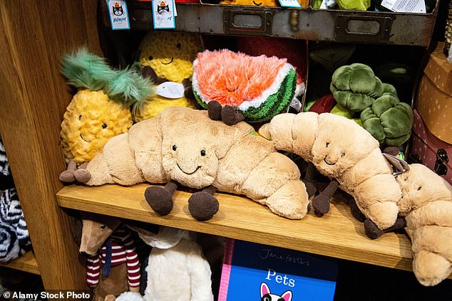 Plush croissants and fruit at a Jellycat store display