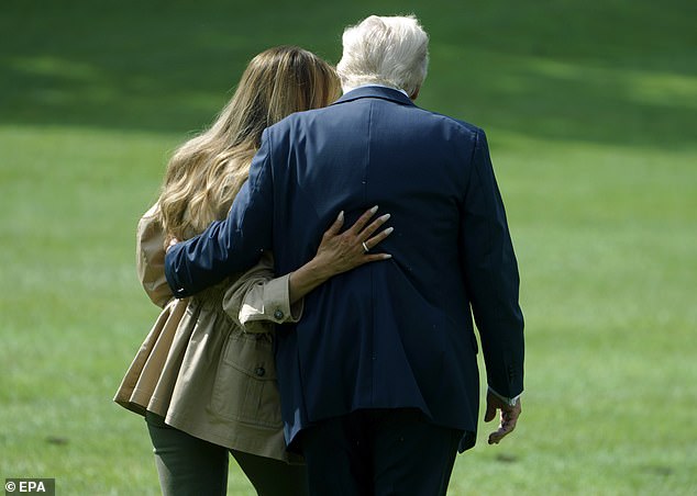 The two could be seen walking to the plane with their arms wrapped around each other's sides