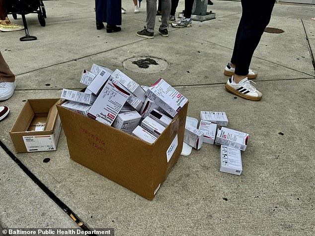 A box overflowing with Narcan can be seen here at the scene, it was used to attempt to revive those found to have overdosed