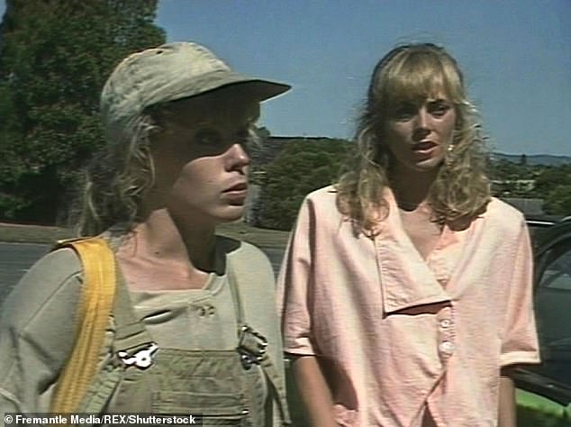 Pictured on set (R) with Kylie Minogue (L)