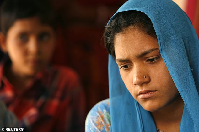 Fourteen-year-old child bride Lalita Saini (R) speaks to Reuters in Jaipur in 2007. She was to go on to live with her 19-year-old husband from a neighbouring village