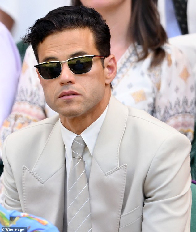 Oscar winner Rami Malek wore a sleek cool-toned summer suit as he watched from the royal box