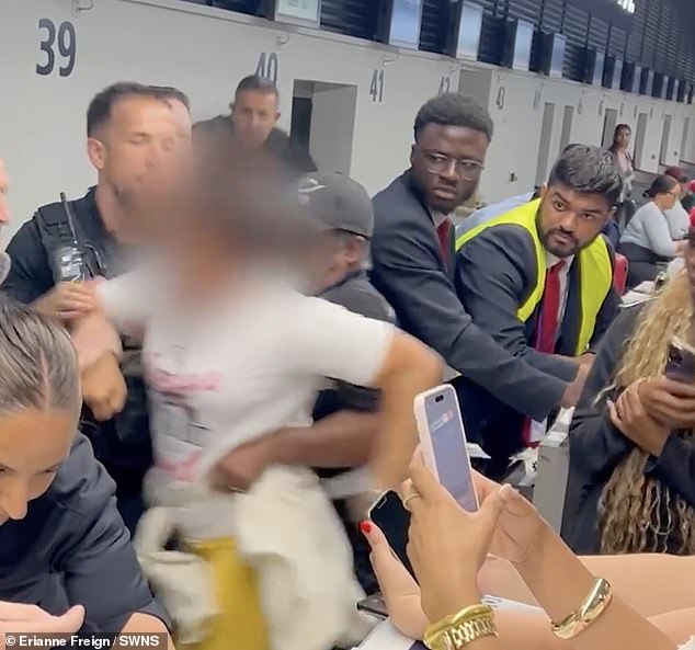 Soon after she was hauled behind the counter by French police