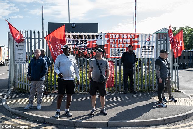 Striking refuse collectors from the Unite trade union attend their picket line on July 9, 2025