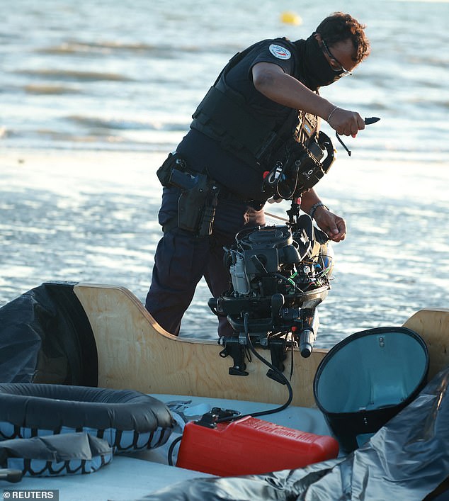 French police are wading into shallow waters and using knives to slash inflatable small boats in an effort to stop crossings