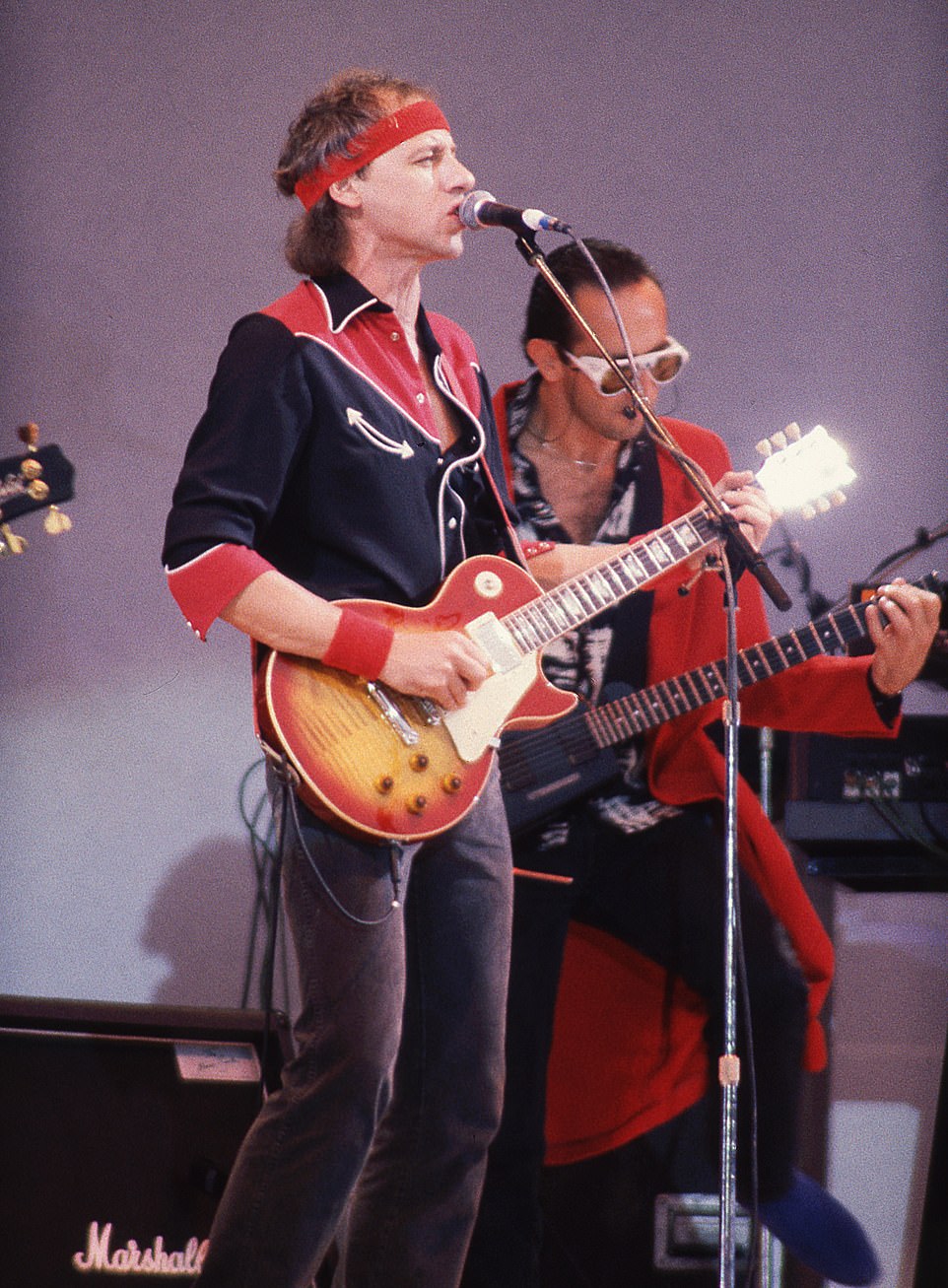 Dire Straits' Mark Knopfler on-stage at the once-in-a-lifetime concert