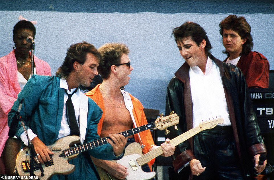 Spandau Ballet's Martin and Gary Kemp with the band's lead singer Tony Hadley