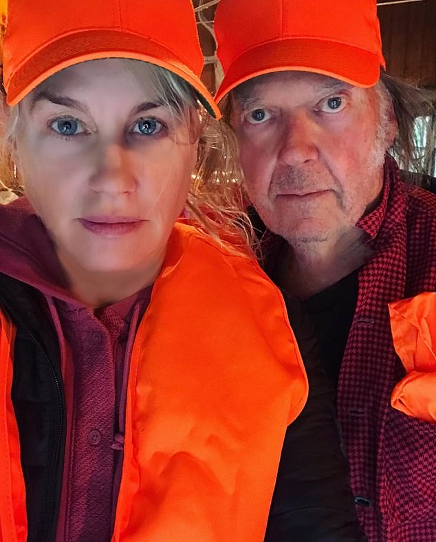 He tells how he 'loves and adores' his wife adding in the song: 'Yeah I'll sing it from the heart, And that'll be the easy part, Singing for my best wife ever, The best cook in the world'. Pictured: Daryl Hannah and Neil Young