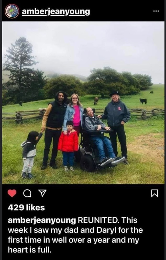 In April 2021, Amber posted a photo (pictured) of her family with Young on Instagram saying: 'Reunited. This week I saw my dad and Daryl for the first time in well over a year and my heart is full.'