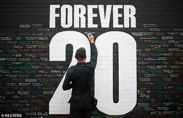 A memorial wall with the message 'Forever 20' has been created neat Anfield