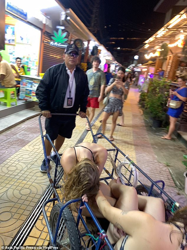 Authorities stepped in to help the girls, aged 19 and 23, back to their rooms after concerned partygoers failed to rouse them at bars on the party island of Koh Phi Phi