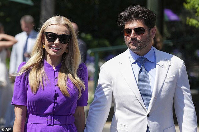 Katherine Jenkins made sure to catch eyes in a stunning bright purple button up summer dress
