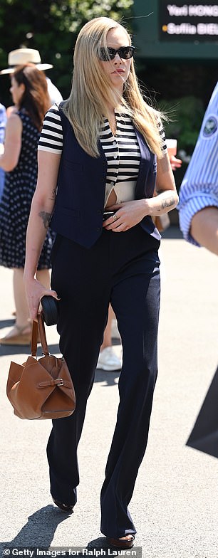 ...and Cara Delevingne who both opted for suits for the penultimate day of the tournament
