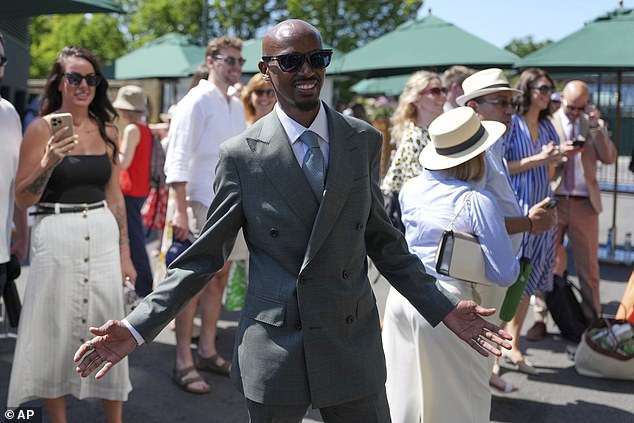 Sir Mo looked in great spirits as he posed for snaps enjoying the day as a spectator