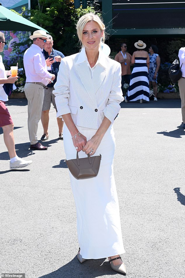 Nicky Hilton Rothschild wowed in a long white collared dress which she wore underneath a white pinstripe blazer jacket