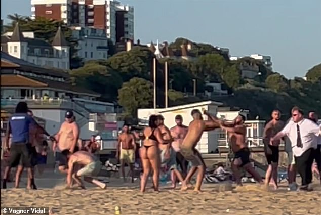The fight, reportedly on Friday evening, saw groups of men wildly swinging punches while two bouncers attempted to break up the brawl