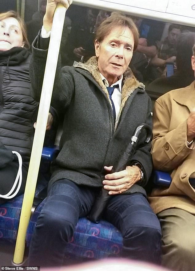 Pop legend Sir Cliff Richard caught passengers by surprise after making his way onto a packed Jubilee Line tube in 2018