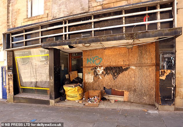 the town is now marked by shuttered shops, boarded-up windows, and quiet streets