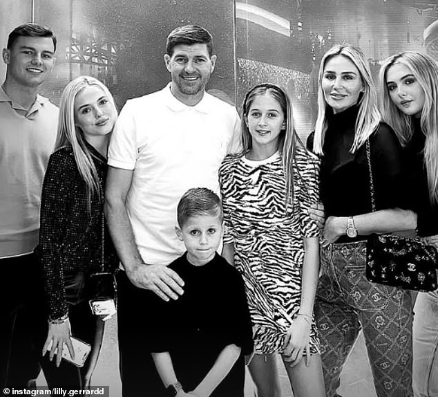 She is due to marry Lee Byrne (far left, with the Gerrard family)
