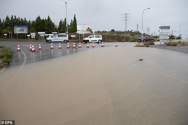 Rescue teams in Zaragoza have reported more than 30 flood-related incident, including blocked roads and fallen trees - but luckily, no casualties. Pictured: Flooding in Aragon on Saturday