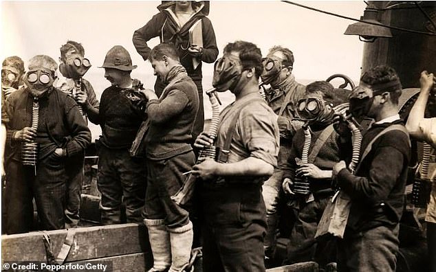 Grimsby was once the busiest fishing port in the world, boasting a fleet of 700 trawlers. Pictured: North Sea fishermen trying on gas masks during World War One