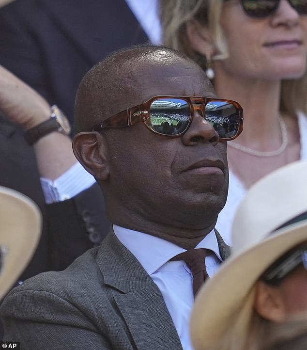Pictured: Journalist, newsreader and presenter, Clive Myrie in the Royal Box on Centre Court on day thirteen at the Wimbledon Tennis Championships