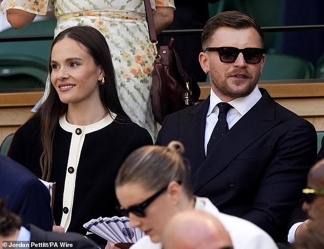 Olympic swimmer Adam Peaty was joined by his partner Holly Ramsay at Wimbledon on Saturday