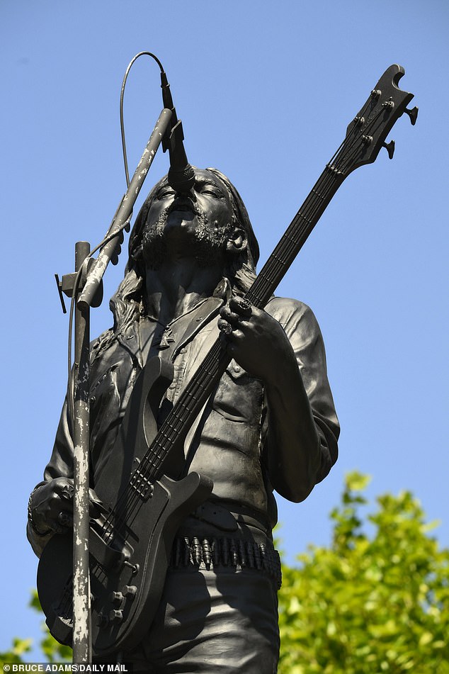 Pictured: A large Lemmy statue stands tall in Market Place. It is said the statue brings in visitors
