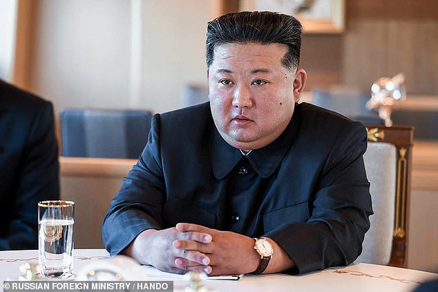 Kim Jong U attends a meeting with Russia's Foreign Minister in Wonsan today
