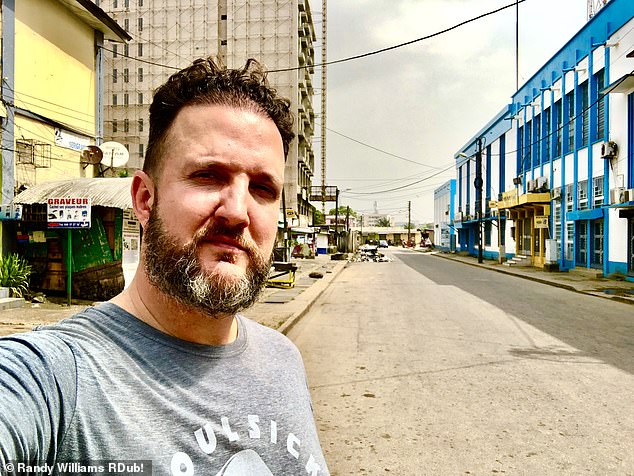 Cameroon, which felt 'joyless' is Randy's least favourite country. He's pictured there in this photo