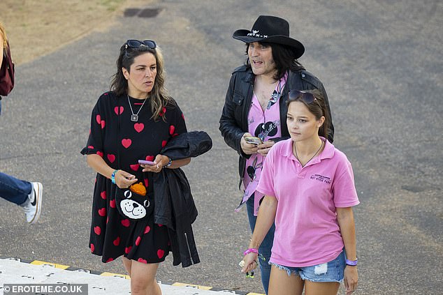 Noel's partner Lliana was by his side as they enjoyed the day out together, accompanied by his brother Michael, too
