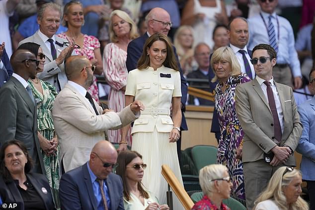 Kate enters the Royal Box to huge cheers and applause ahead of Saturday's final