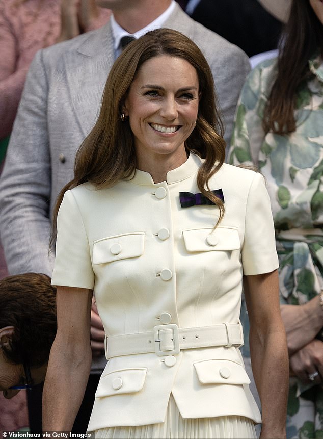 Catherine smiles in the Royal Box prior to the the Ladies' Singles Final at Wimbledon