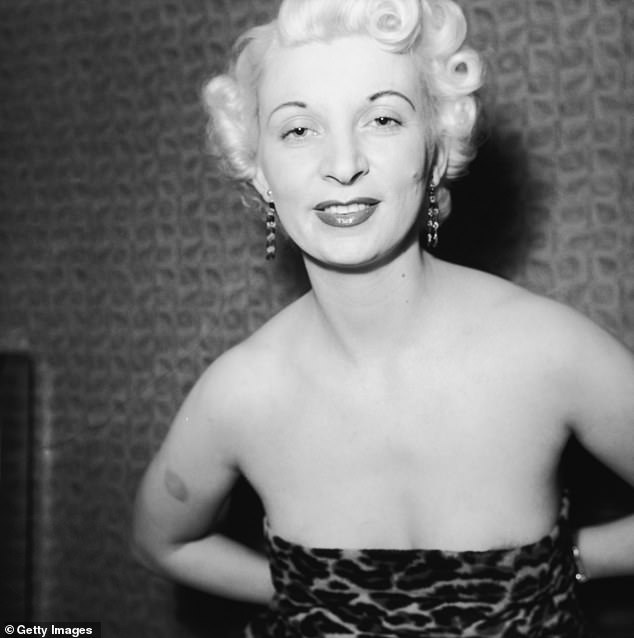 Ellis poses in a leopard print dress in 1954, the year before she was hanged for murder