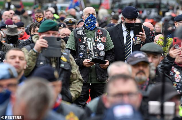 Former British armed forces members and supporters take part in a 'Respect Our Veterans' parade and rally, following the collapse of the trial in Belfast of two British soldiers over the killing of Official IRA leader Joe McCann -- May 8, 2021