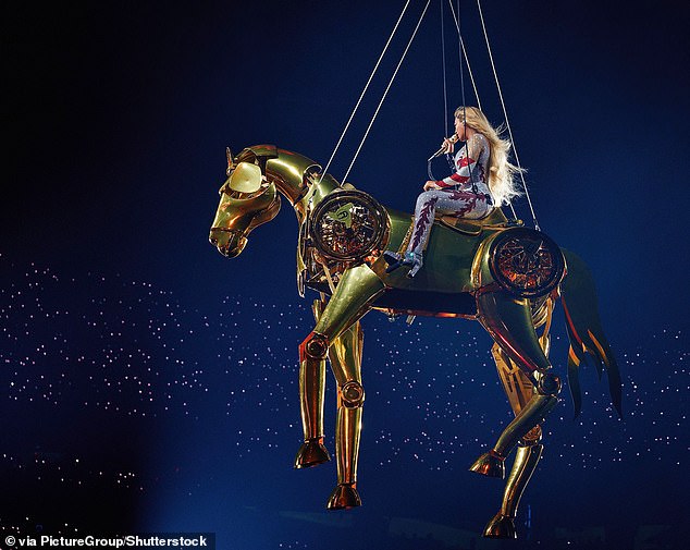 The Grammy winner took to the stage in Atlanta on Thursday where she debuted a mechanical gold horse which she rode inside the Mercedes- Benz Stadium