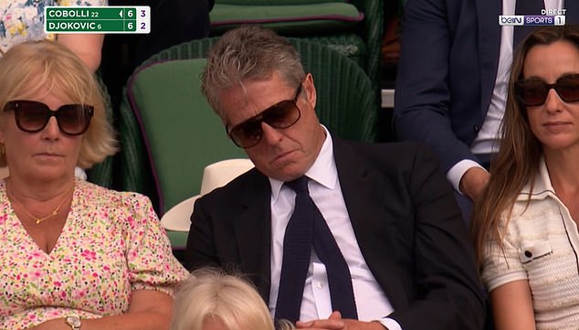 Love Actually star Hugh Grant falls asleep at Wimbledon during the men's quarter-final clash between Novak Djokovic and Flavio Cobolli