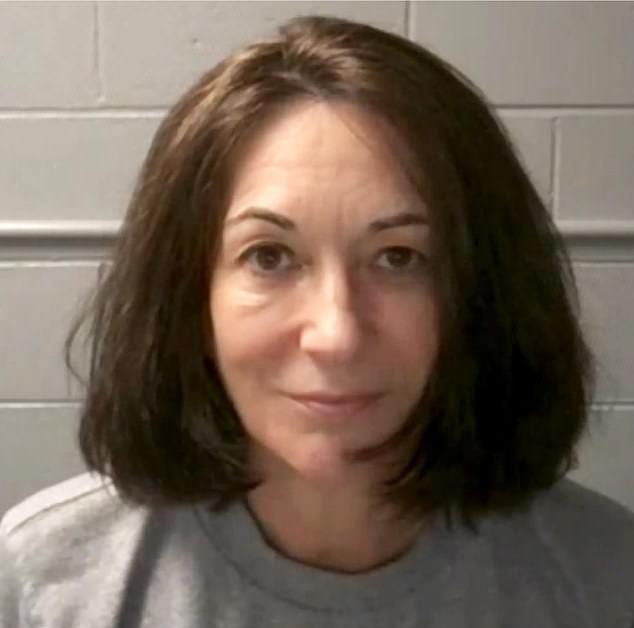 Ghislaine Maxwell pictured here in her mugshot