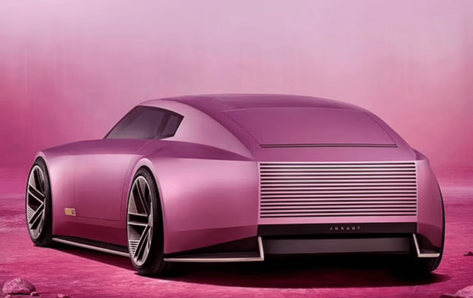 Rear view of a pink Jaguar electric concept car.