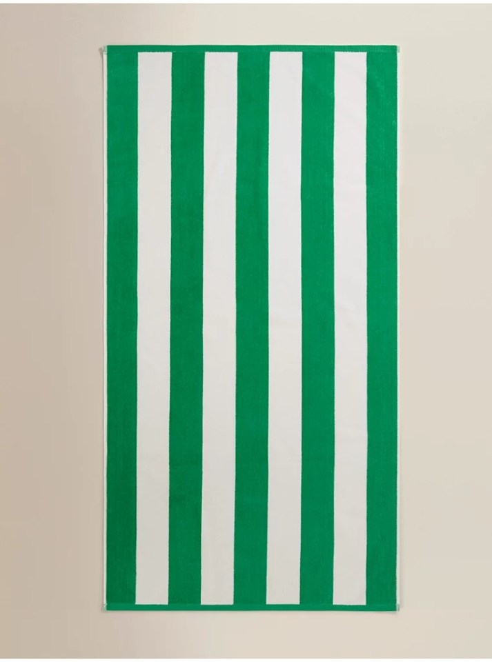 Green and white striped beach towel.