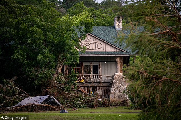 The private Christian girls' camp located on the Guadalupe River, was struck by a sudden and catastrophic wall of water during the early hours of Independence Day. Pictured: Debris is piled up at Camp Mystic