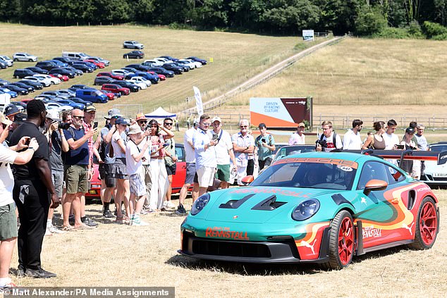 Dua Lipa at the Goodwood Festival of Speed, where she went up the world famous hillclimb in the Dua Lipa Renstall Porsche 911 GT3 RS driven by Iron Dames racing driver Karen Gaillard