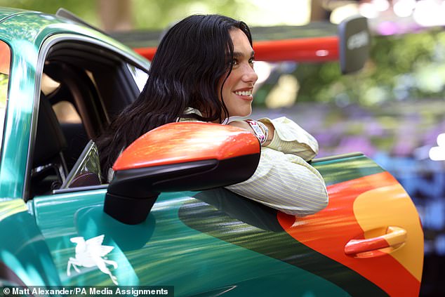 The 29-year-old headed to West Sussex for the charity auction of a customised Porsche 911 GT3 RS