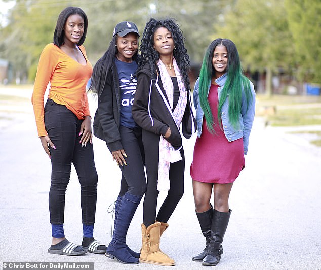 Pictured: Kamiyah with her biological sisters, Shuriah, Shakaria, and Shadawn, in 2018