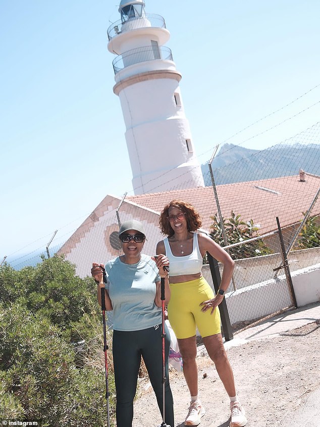 They got in a hike in Mallorca, as Oprah was seen grinning while holding two hiking poles