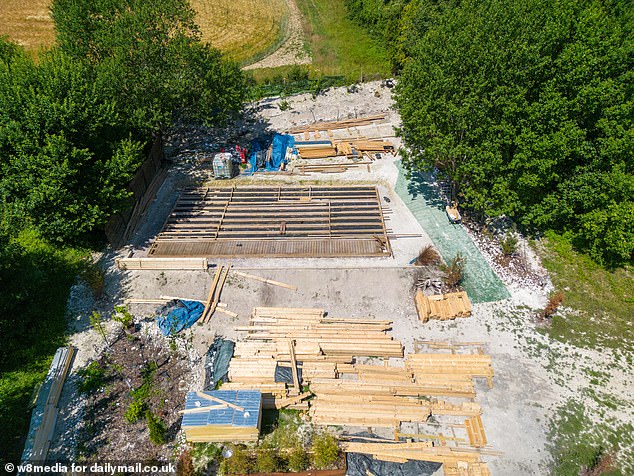 AFTER: But their dreams were scuppered when planners stepped in and ordered them to pull down the 1,200 sq ft fully insulated spruce cabin (pictured after demolition)