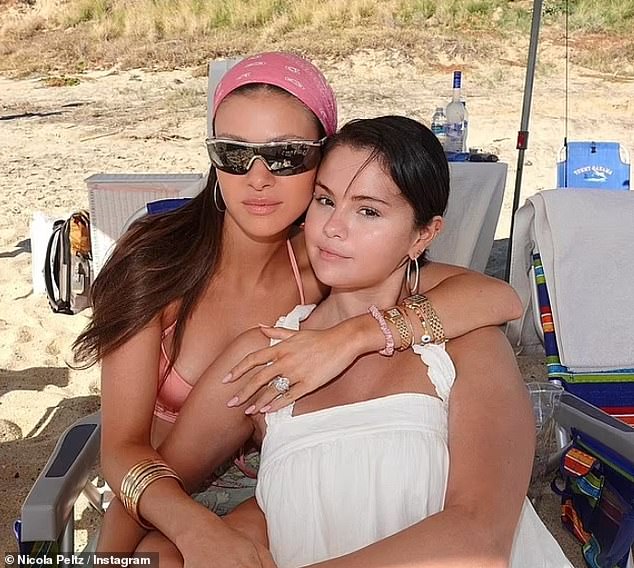 They were first spotted hanging out in November 2022 and jetted off to Mexico in 2023 with a group of friends where they rang in the New Year (Nicola and Selena pictured together)