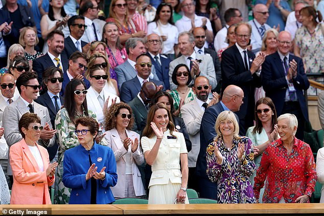 Princess Catherine waves to spectators ahead of the Women's Wimbledon final today